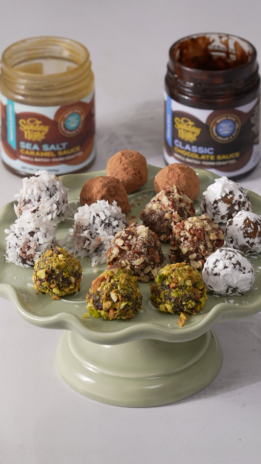 Assorted Chocolate Date Balls with Coconut, Dusted Cocoa, and chopped nuts