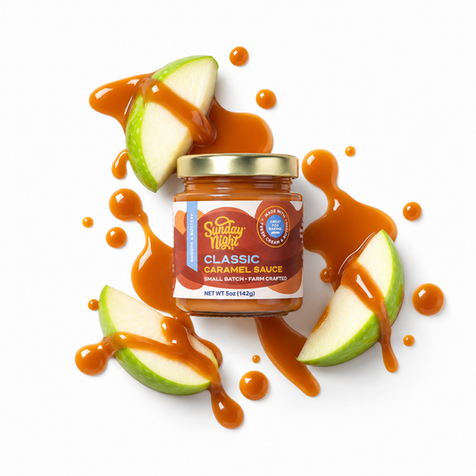 Sea Salt Caramel jar in the center of drizzled caramel over top of apples.