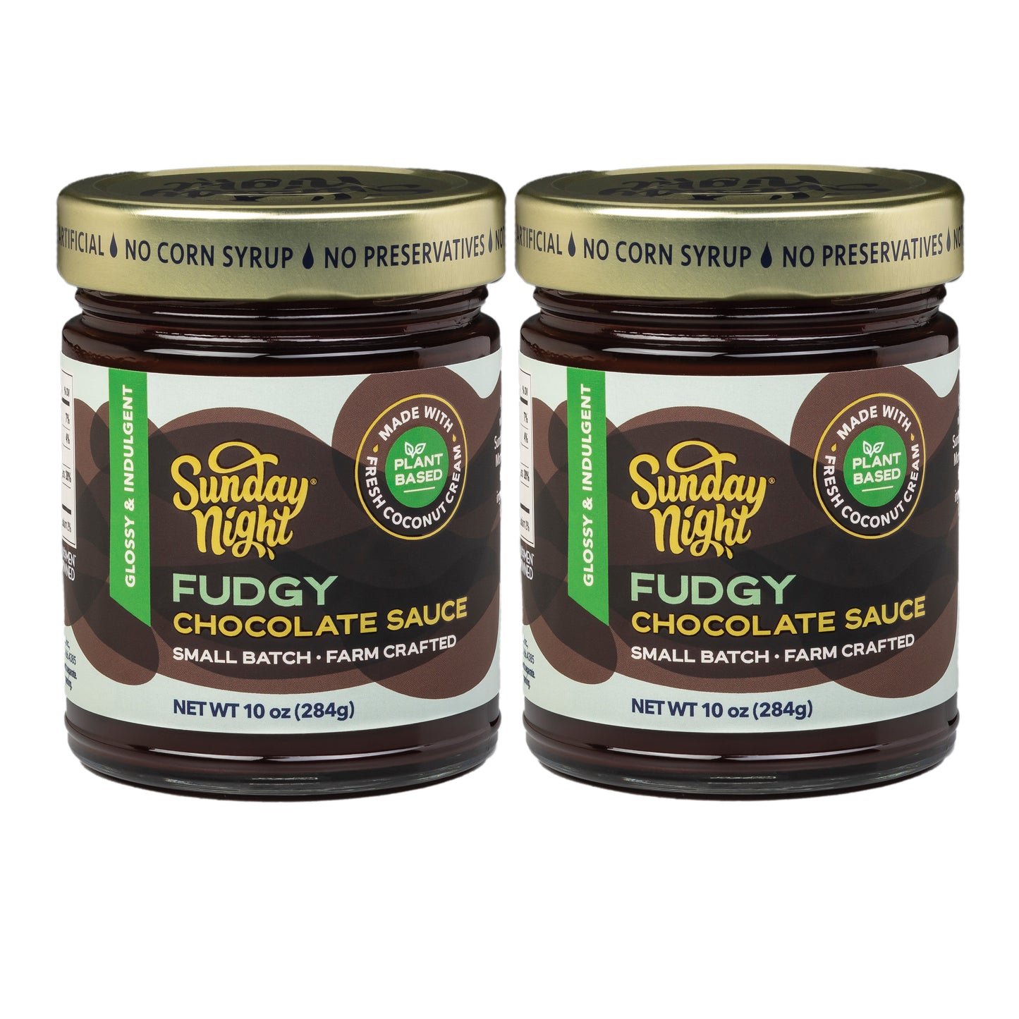 Two jars of Sunday Night Fudgy Chocolate Sauce on a white background