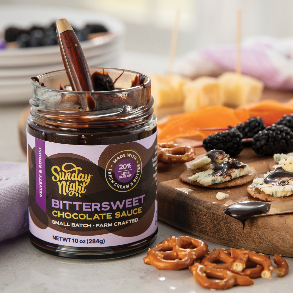 Sunday Night Foods Bittersweet (Dark) Chocolate Sauce has 20 percent less sugar and pairs great with pretzels, berries and even cheese.